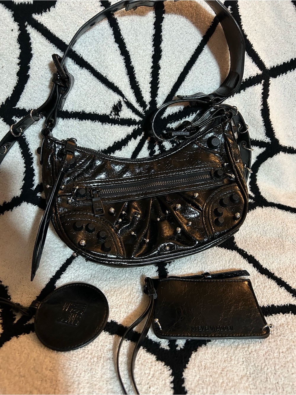 Steve Madden Black Patent Shoulder with piercings